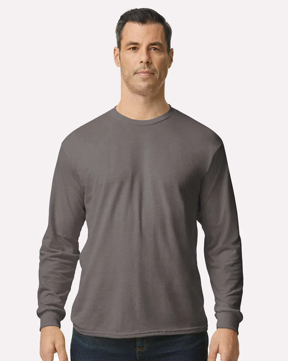 Model wearing a charcoal Gildan 5400 long sleeve t-shirt
